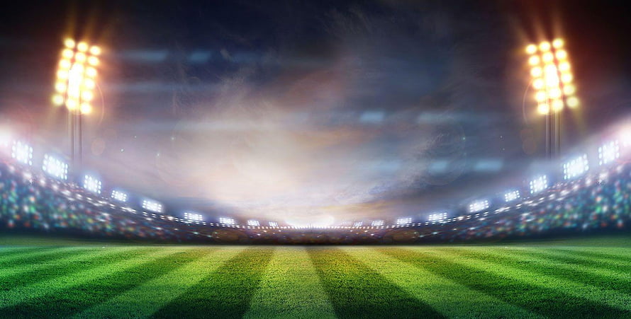 Illuminated Cricket Stadium at Night with Glowing Floodlights and Green Pitch HD wallpaper