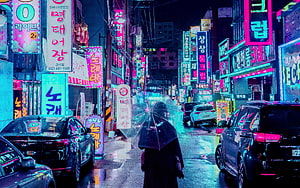 Rainy Night in a Korean City with Neon Signs and a Person Holding an Umbrella HD wallpaper