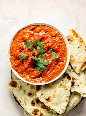 Creamy Chicken Tikka Masala Curry with Fresh Cilantro and Naan Bread HD phone wallpaper
