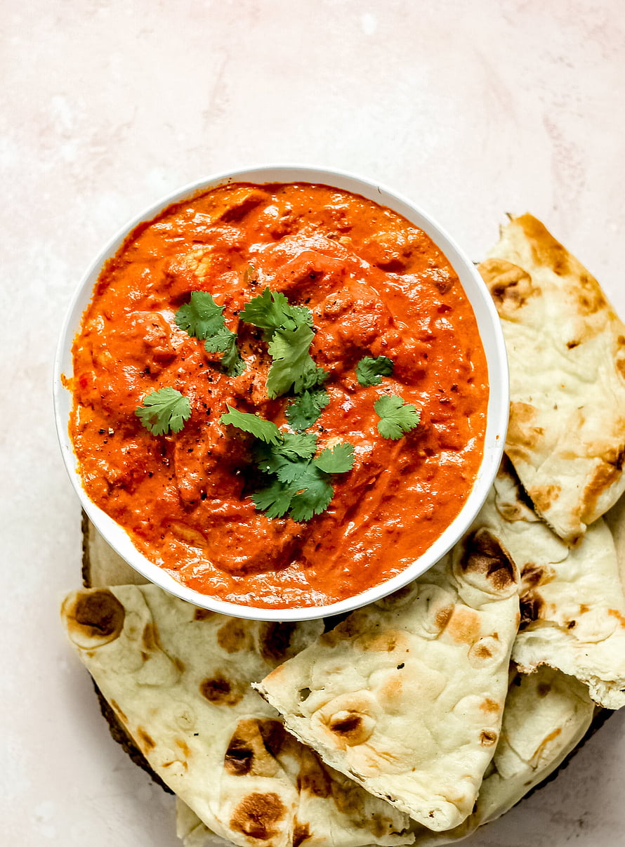 Creamy Chicken Tikka Masala Curry with Fresh Cilantro and Naan Bread HD phone wallpaper