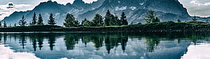 Serene Mountain Lake Reflection with Pine Trees and Snow-Capped Peaks HD wallpaper