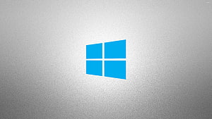 Windows 10 Blue Window Logo on Textured Gray Background HD wallpaper