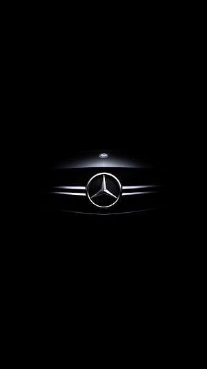 Mercedes-Benz Grille Emblem Illuminated Against a Pitch Black Background HD phone wallpaper