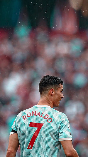 Cristiano Ronaldo in Manchester United Away Kit on the Pitch HD phone wallpaper