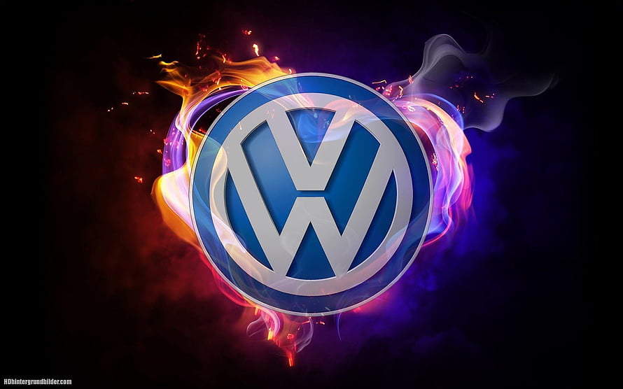 Volkswagen Logo Surrounded by Vibrant Flames and Smoke on Dark Background HD wallpaper