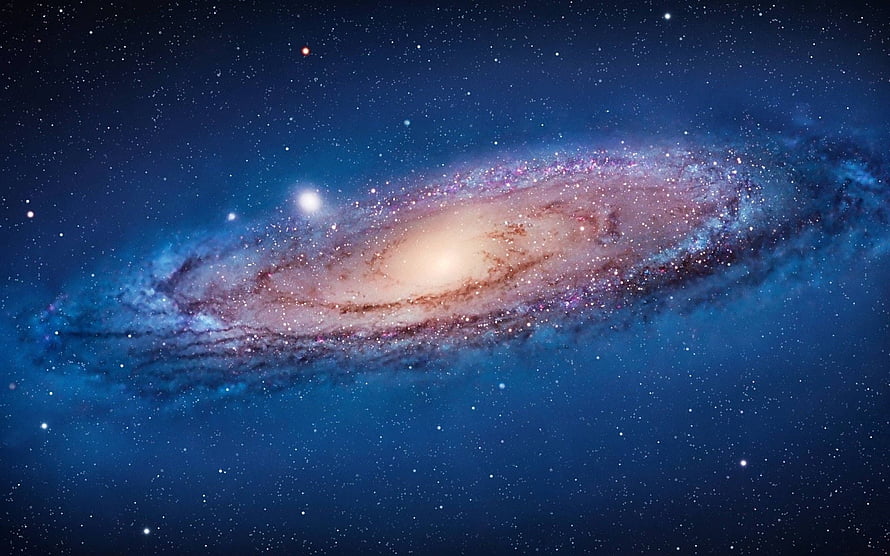 Majestic Spiral Galaxy with Luminous Core and Dust Lanes in Deep Space HD wallpaper