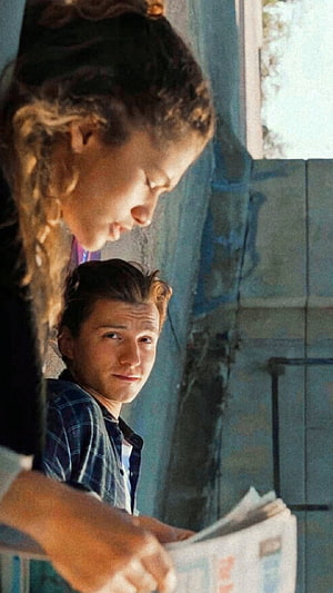 Tom Holland and Zendaya in a candid moment from Spider-Man film HD phone wallpaper