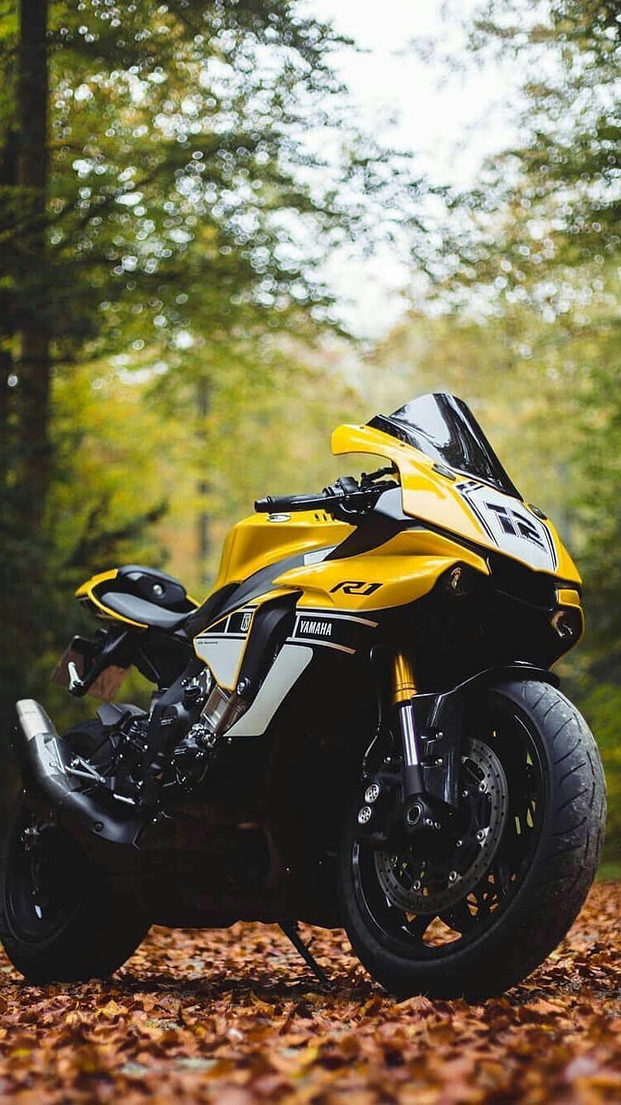 Yamaha R1 Superbike in Yellow and Black Parked on Autumn Forest Floor HD phone wallpaper