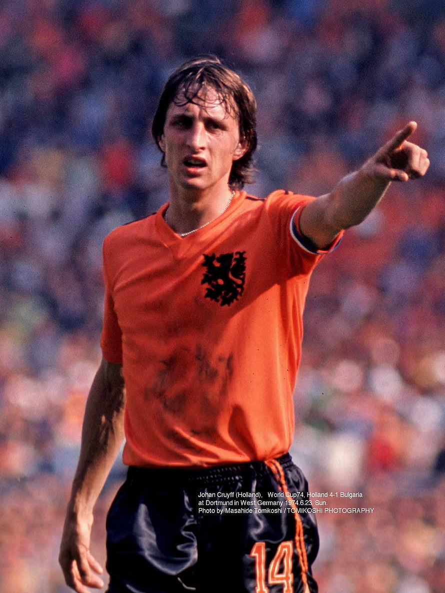 Johan Cruyff in the Netherlands orange jersey pointing during a 1974 World Cup match HD phone wallpaper