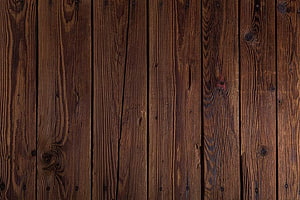 Dark Brown Vertical Wood Plank Texture with Natural Grain and Knots HD wallpaper