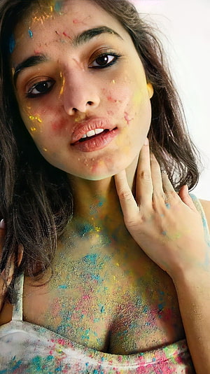 Kethika Sharma Portrait Covered in Vibrant Holi Festival Colored Powders HD phone wallpaper