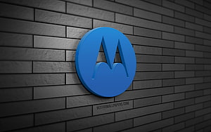 Motorola 3D Blue Logo Mounted on Dark Gray Brick Wall HD wallpaper