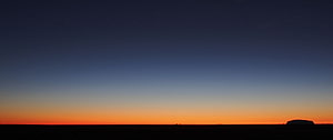 Minimalist Desert Horizon at Dusk with Vibrant Orange and Deep Blue Sky Gradient HD wallpaper