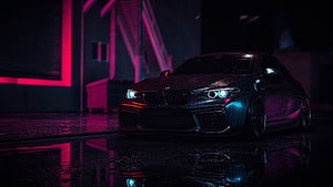 BMW M4 Coupe in Neon-Lit Night Scene with Wet Asphalt Reflections HD wallpaper