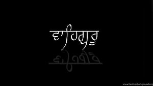 Waheguru Gurmukhi Script Calligraphy on Black Background with Reflection HD wallpaper