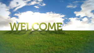 Welcome Text on Green Grass Field Under Blue Sky with White Clouds HD wallpaper