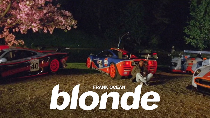 Frank Ocean Blonde Music Video Scene with Supercars and Cherry Blossoms HD wallpaper