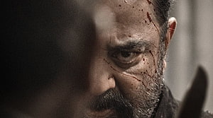 Kamal Haasan Intense Close-Up Portrait with Blood Streaks in Vikram Film Poster HD wallpaper
