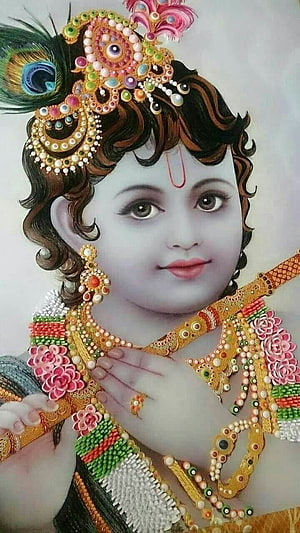 Little Krishna Portrait with Peacock Feather Crown and Ornate Jewelry HD phone wallpaper