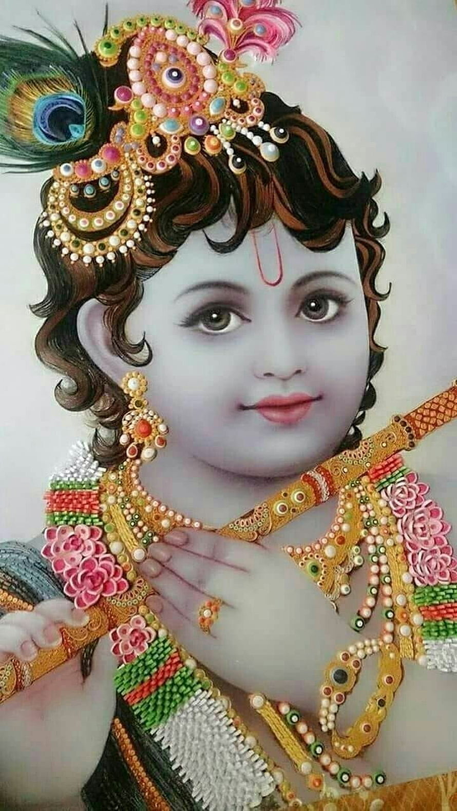 Little Krishna Portrait with Peacock Feather Crown and Ornate Jewelry HD phone wallpaper