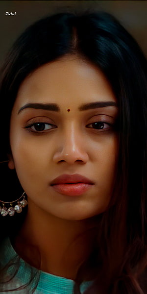 Nivetha Pethuraj Close-Up Portrait with Traditional Bind and Jhumka Earrings HD phone wallpaper