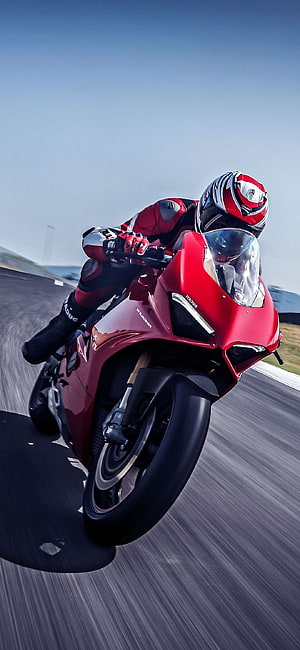 Ducati Panigale V4 Superbike Cornering at Speed on a Race Track HD phone wallpaper