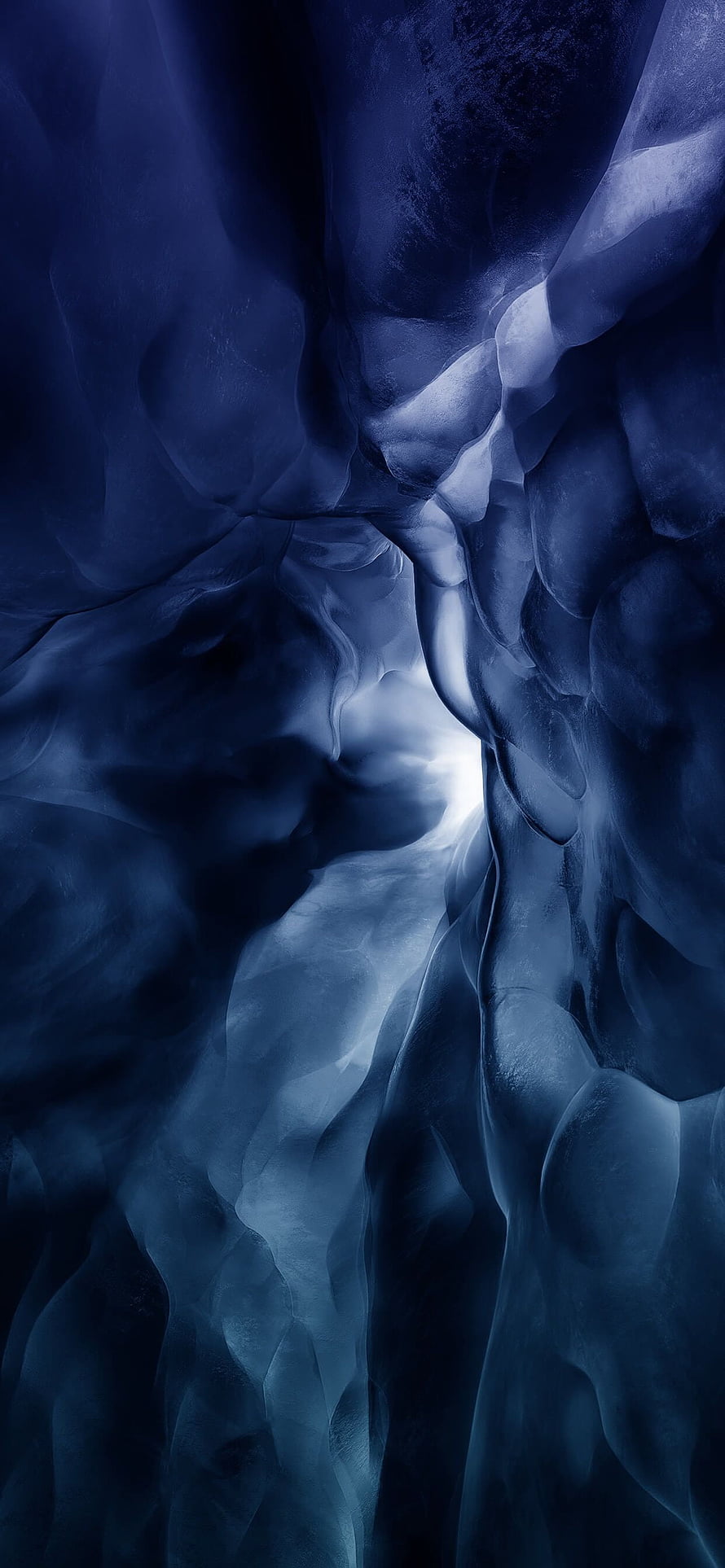 Deep Blue Ice Cave Interior with Ethereal Light and Smooth Frozen Walls HD phone wallpaper