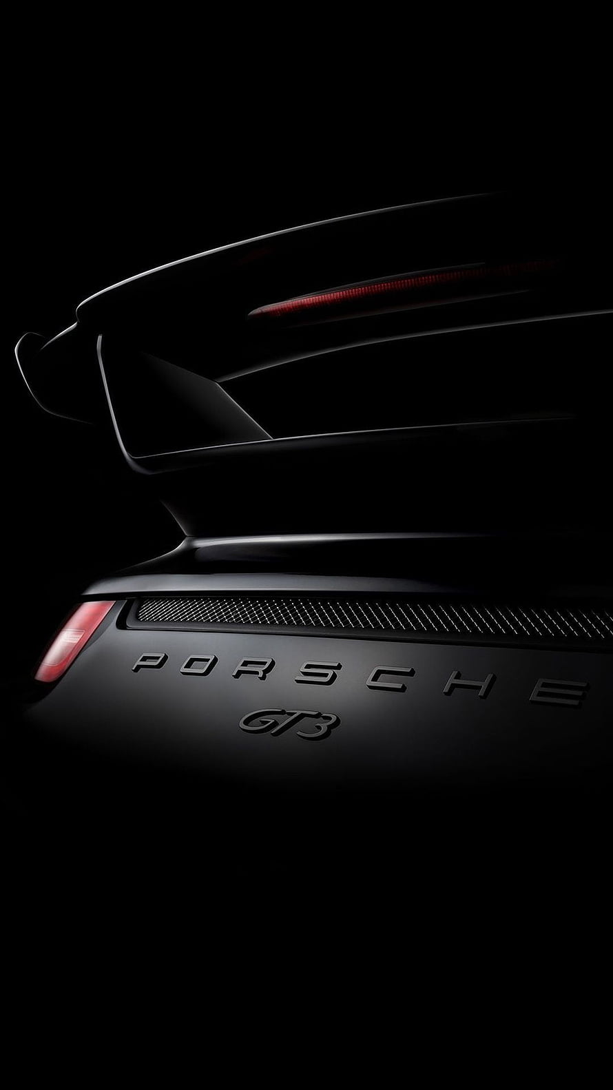 Porsche GT3 Rear Spoiler and Badge Detail in Dramatic Black Lighting HD phone wallpaper