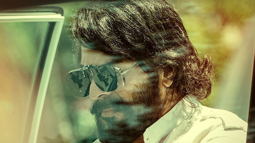 Mammootty in Bhishma Parvat cinematic still with sunglasses and beard HD wallpaper