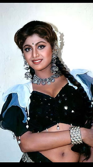 Shilpa Shetty in Traditional Indian Attire with Silver Jewelry and Floral Hairpiece HD phone wallpaper