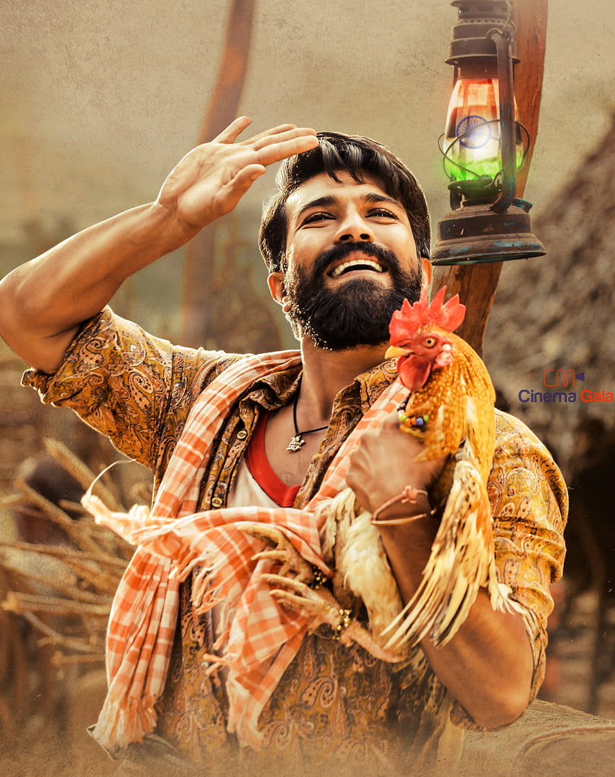 Rangasthalam Ram Charan holding rooster in rustic village setting HD phone wallpaper