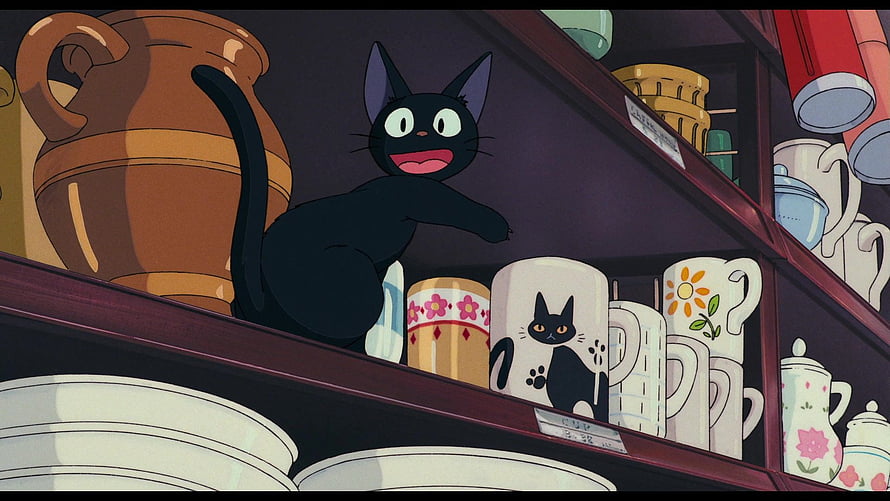 Jiji the Black Cat from Kiki's Delivery Service Perched on a Pottery Shelf HD wallpaper