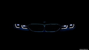 BMW 330i M Sport Front Grille and Headlights Illuminated in Darkness HD wallpaper