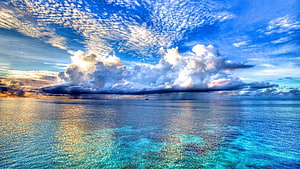 Tropical Ocean Horizon With Dramatic Clouds And Turquoise Shallow Waters HD wallpaper