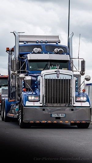 Blue Kenworth Semi Truck with Chrome Grille and LED Lights HD phone wallpaper