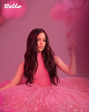 Jenna Ortega in a voluminous pink tulle gown against a soft magenta studio backdrop HD phone wallpaper