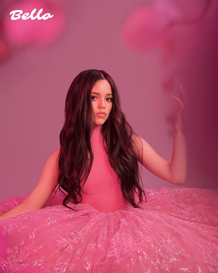 Jenna Ortega in a voluminous pink tulle gown against a soft magenta studio backdrop HD phone wallpaper