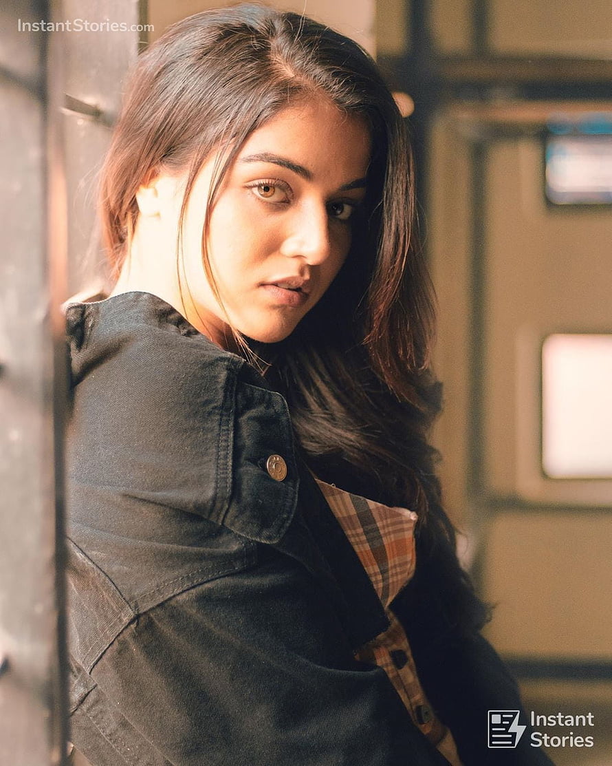 Wamiqa Gabbi in a dark denim jacket and plaid shirt with warm natural lighting HD phone wallpaper