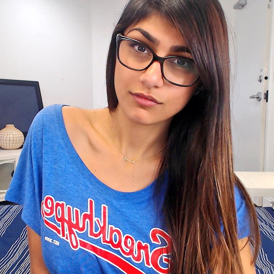 Mia Khalifa in a Blue Brooklyn T-Shirt and Black Framed Glasses HD phone wallpaper