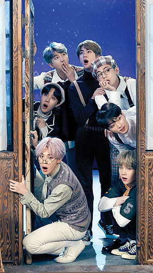 BTS Members Peeking Through Wooden Door With Surprised Expressions HD phone wallpaper
