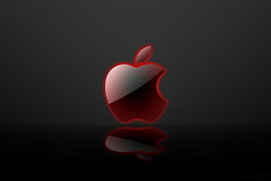 Glowing Red Apple Logo on Dark Reflective Surface HD wallpaper