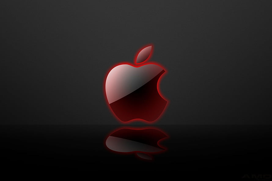 Glowing Red Apple Logo on Dark Reflective Surface HD wallpaper