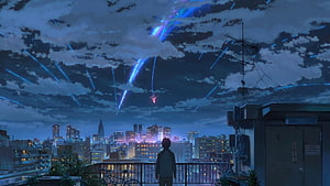 Anime Boy Watching Meteor Shower Over City Skyline at Night HD wallpaper