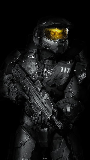 Master Chief in Black Armor Holding Rifle with Golden Visor from Halo Infinite HD phone wallpaper