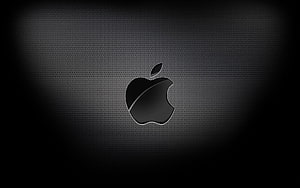 Sleek Apple Logo on Dark Carbon Fiber Texture with Subtle Vignette HD wallpaper