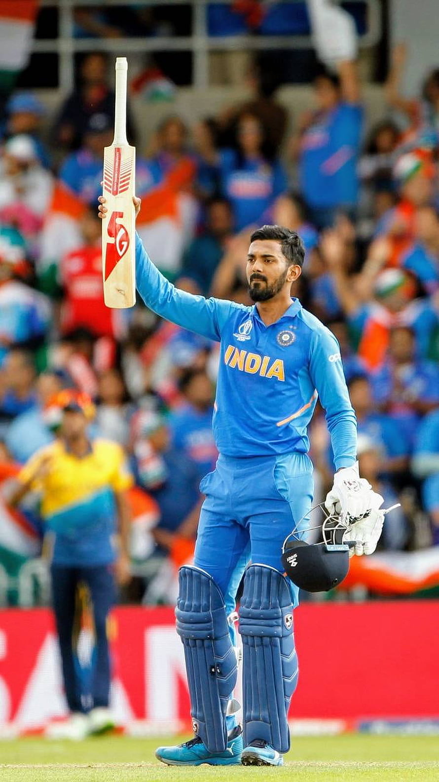 KL Rahul Celebrates a Milestone with Bat Raised in India Cricket Jersey HD phone wallpaper