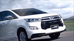 White Toyota Innova Crysta Front View on Open Road HD wallpaper