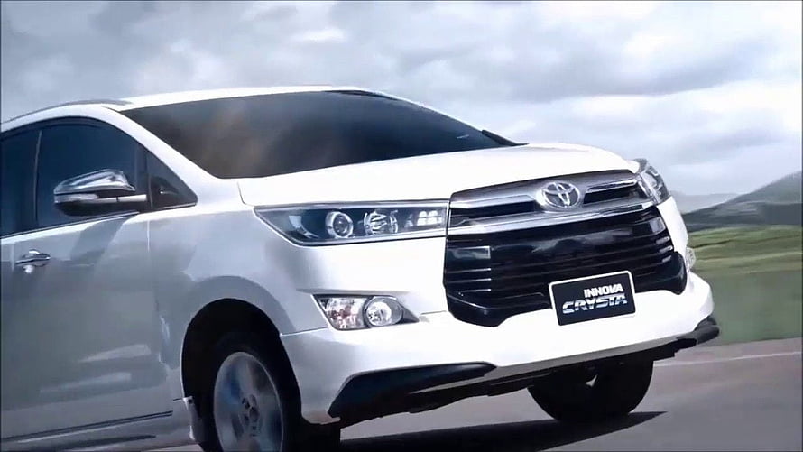 White Toyota Innova Crysta Front View on Open Road HD wallpaper
