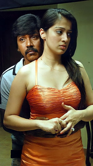 Kanchana Movie Still Featuring Raghava Lawrence and Lakshmi Rai in Dramatic Scene HD phone wallpaper
