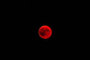 Blood Moon Eclipse Glowing Red Against Deep Black Night Sky HD wallpaper